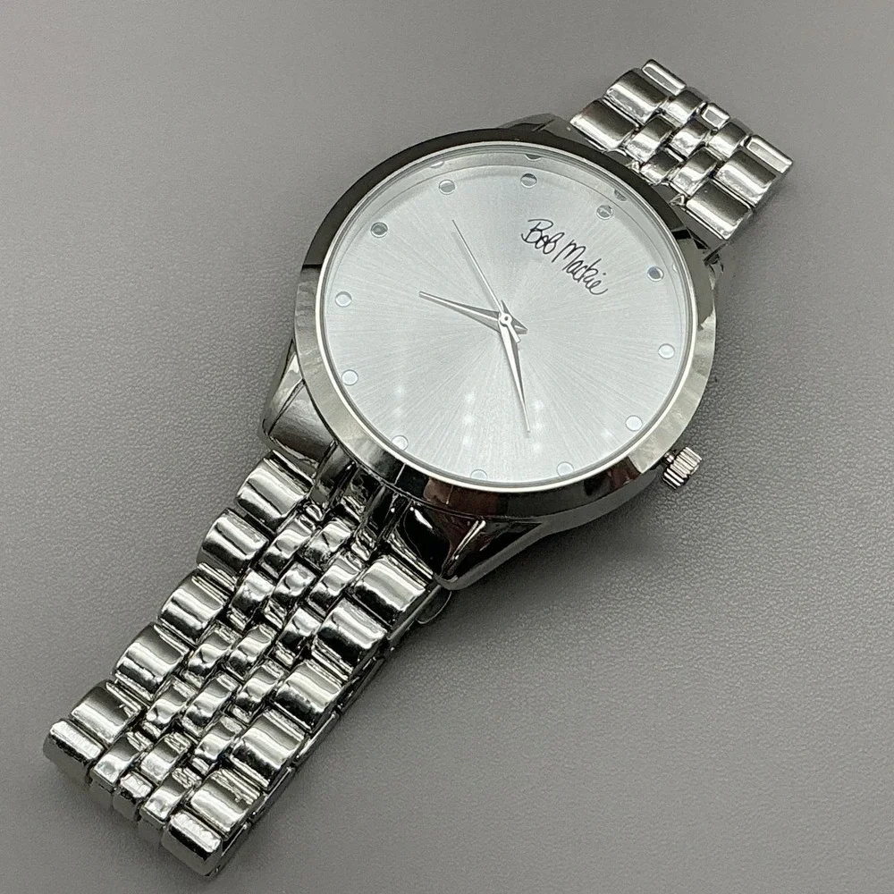 Bob Mackie Womens Watch Silver Dial Silver Tone Bracelet Quartz Analog BMS4010SS